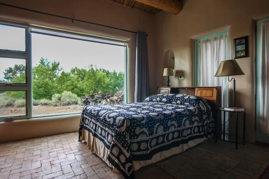 Bed with view of the Sangre de Cristo mountains to east