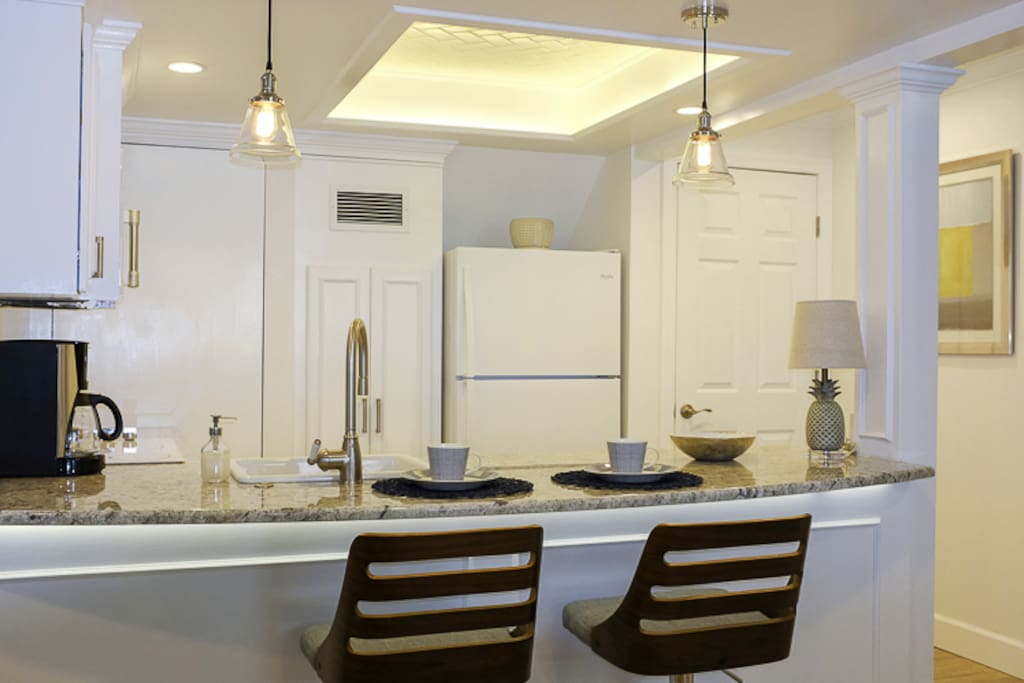 Kitchen with Granite Counter top & Dimmable Lighting Options