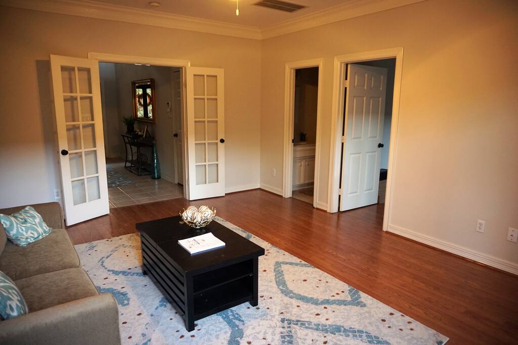 First floor suite with queen pull out couch and shared full bathroom