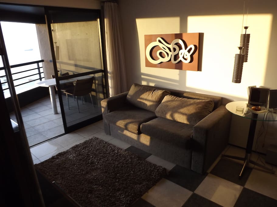 Cozy living room with sofa bed fits two people. It has cable tv, sound equipment, and
WiFi internet.