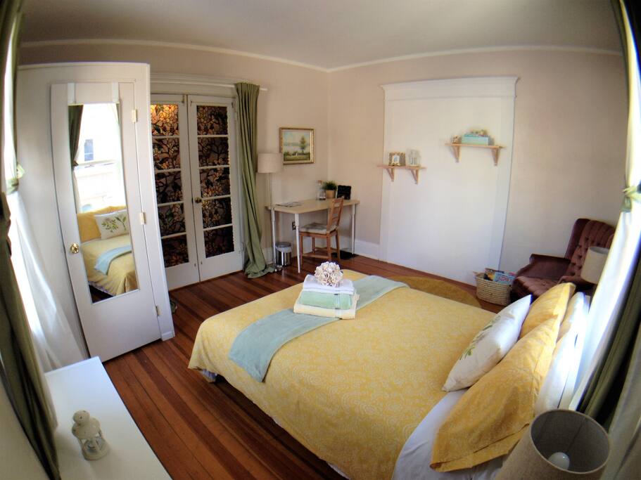 sunny room with full size bed