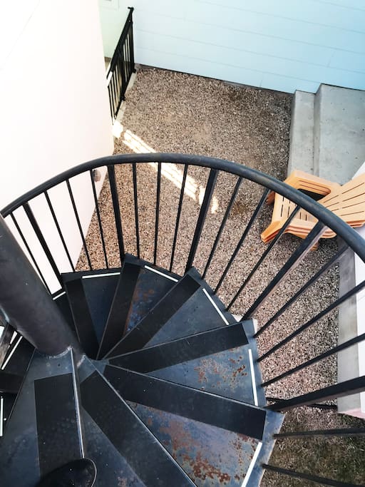 private entrance via spiral staircase