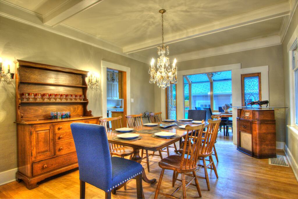 Formal dining room with period chandelier.