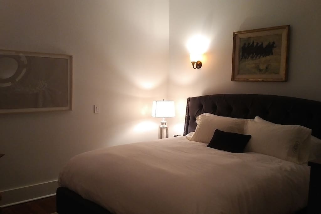 King bed with Belgian linen sheets, down comforter and gas fireplace.