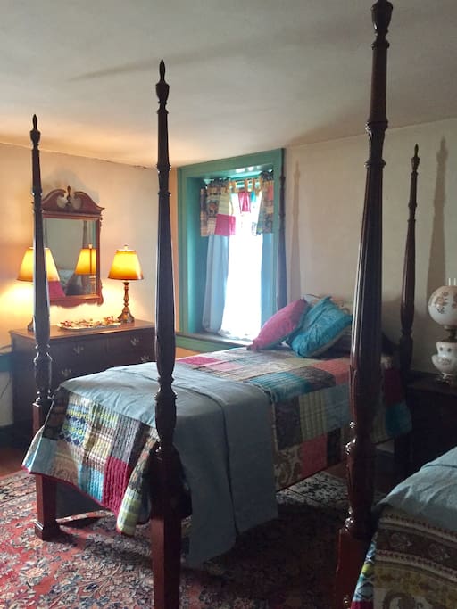 Blue Room - This is your Blue (well, turquoise) Room: Features twin four poster beds. A nice bright room facing south. You may need a stepstool to climb o the tall bedding (we'll povide one...)
