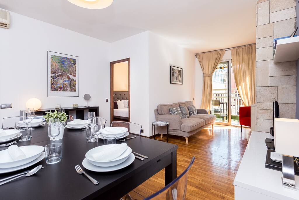 Master bedroom located off the main living and dining area with balcony