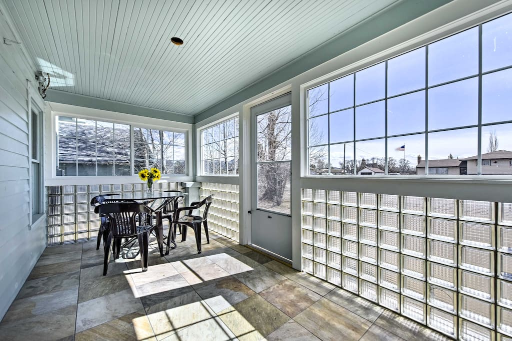 Enjoy warm mornings in the sun on the enclosed porch.
