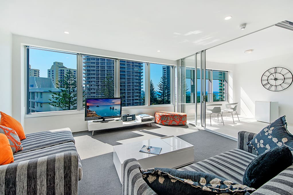 Living area and enclosed balcony.