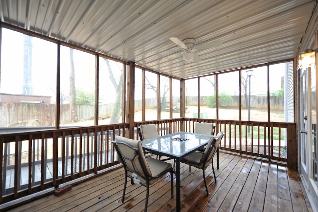 The screened-in porch, which is also a private entrance.