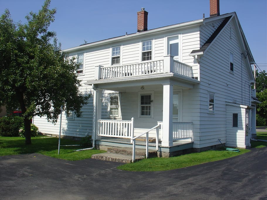 Parking for 2 vehicles is behind the house. Parralel to the porch please. Preferably closer to the garage or the middle spot to accommodatethe downstairs tenet.
The upper apt has access to the back porch off the kitchen.