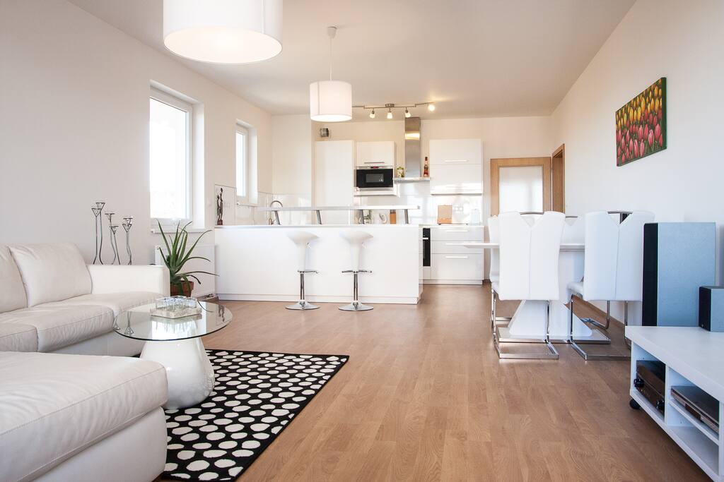 The living room with the dining table where also extra two matraces can be placed if needed