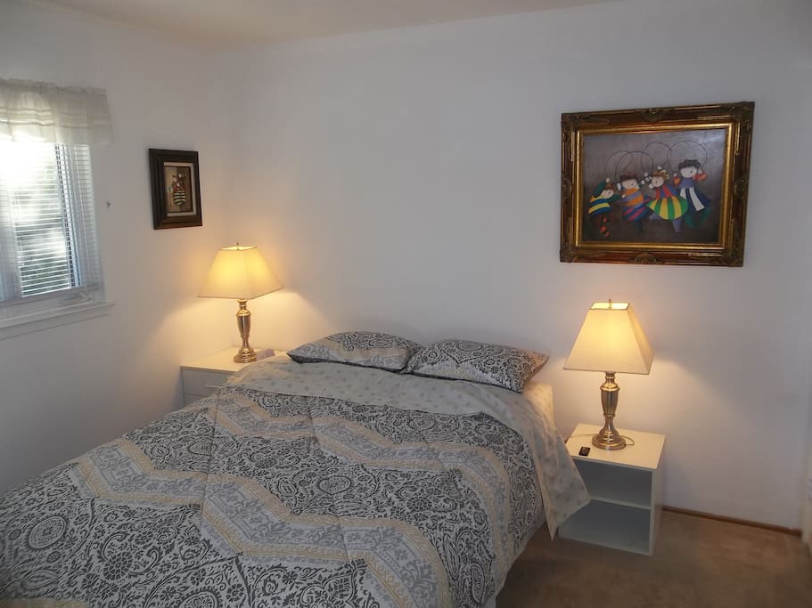 Queen bedroom overlooking back garden. Has a locking door