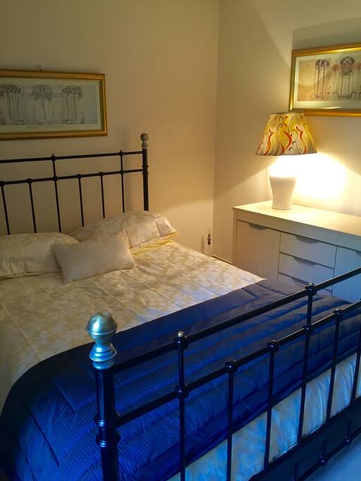 Bright and comfortable room with double bed and built in wardrobe.