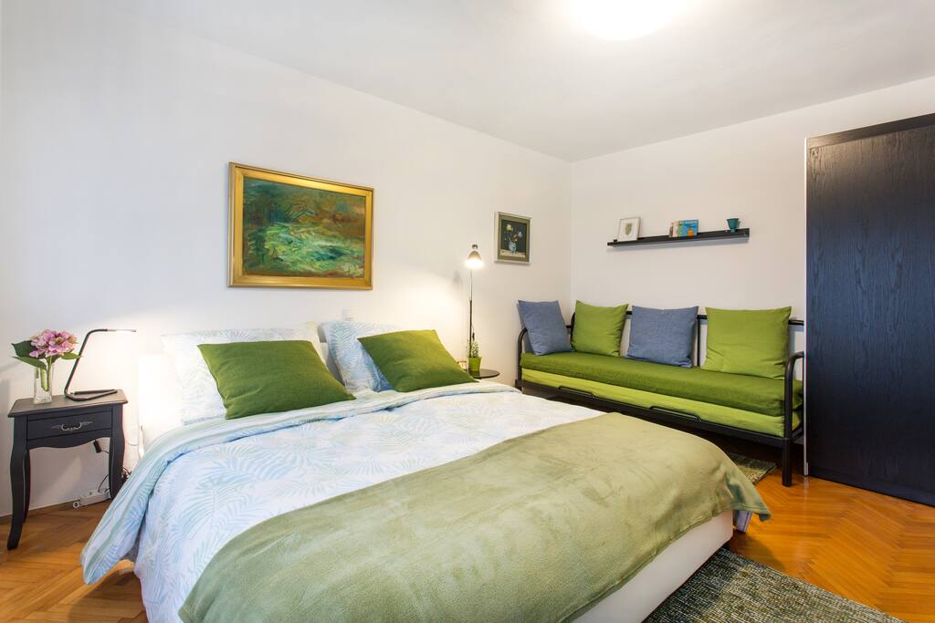 Next to the double bed you can find a fold-out sofa