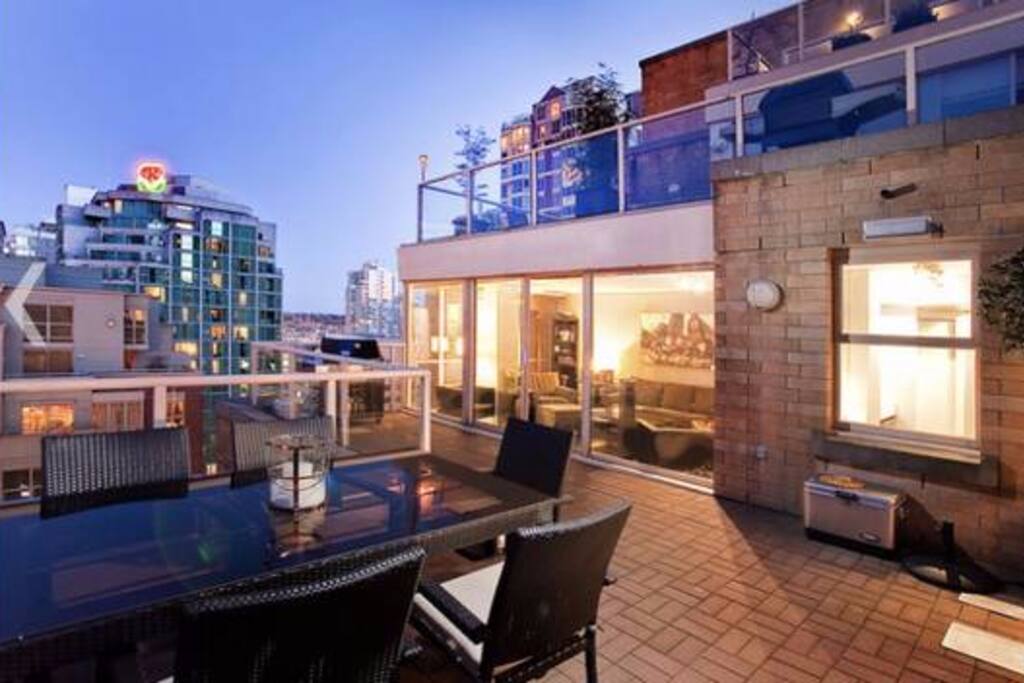 Furnished patio with custom bar and outdoor fridge