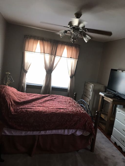 Full Bed, lots of natural light and a flat screen tv and DVD player.