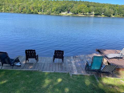 Colton Carvel Cottage with a Lake Front View