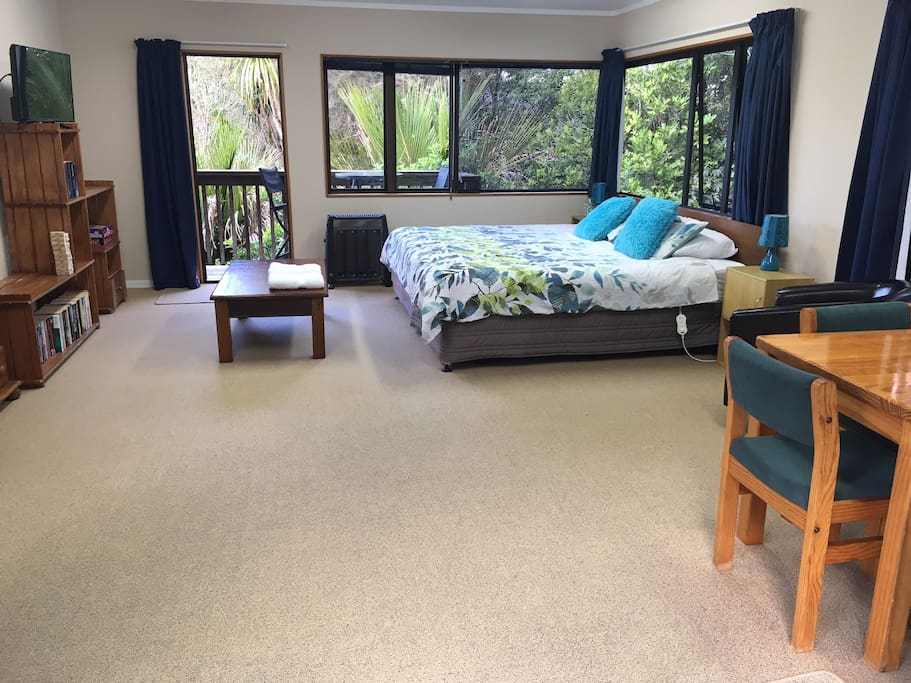 Huge main bedroom with deck opening onto bush