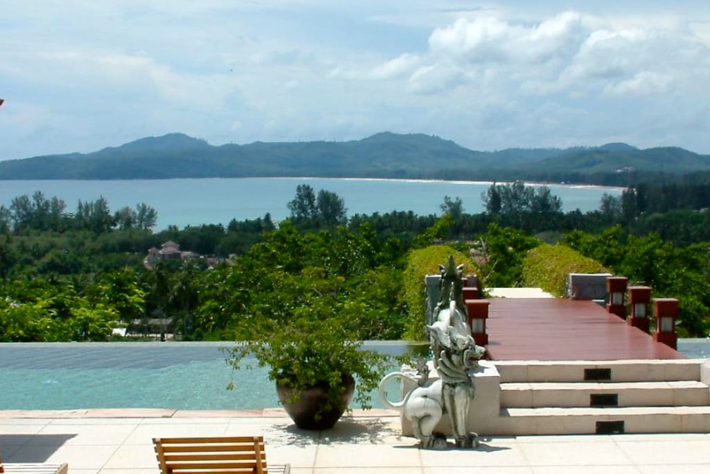 Stunning view of Bangtao beach and bay from the pool terrace.