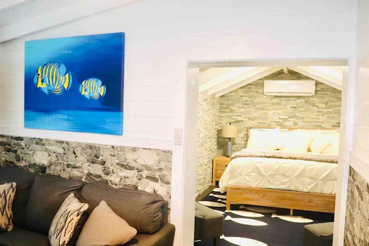 A view from the master bedroom suite located in the Guest House. The bedroom is attached to a small private living room