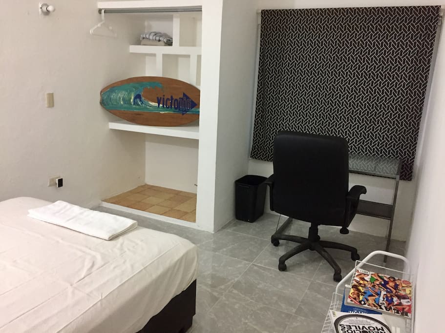 Really nice and clean room with double size bed, a/c, roof fan, desk and awsome chair to work.