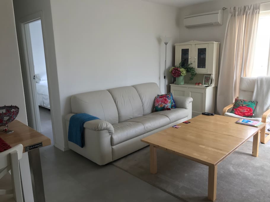Large Lounge couch and table allows for lots of relaxing and games