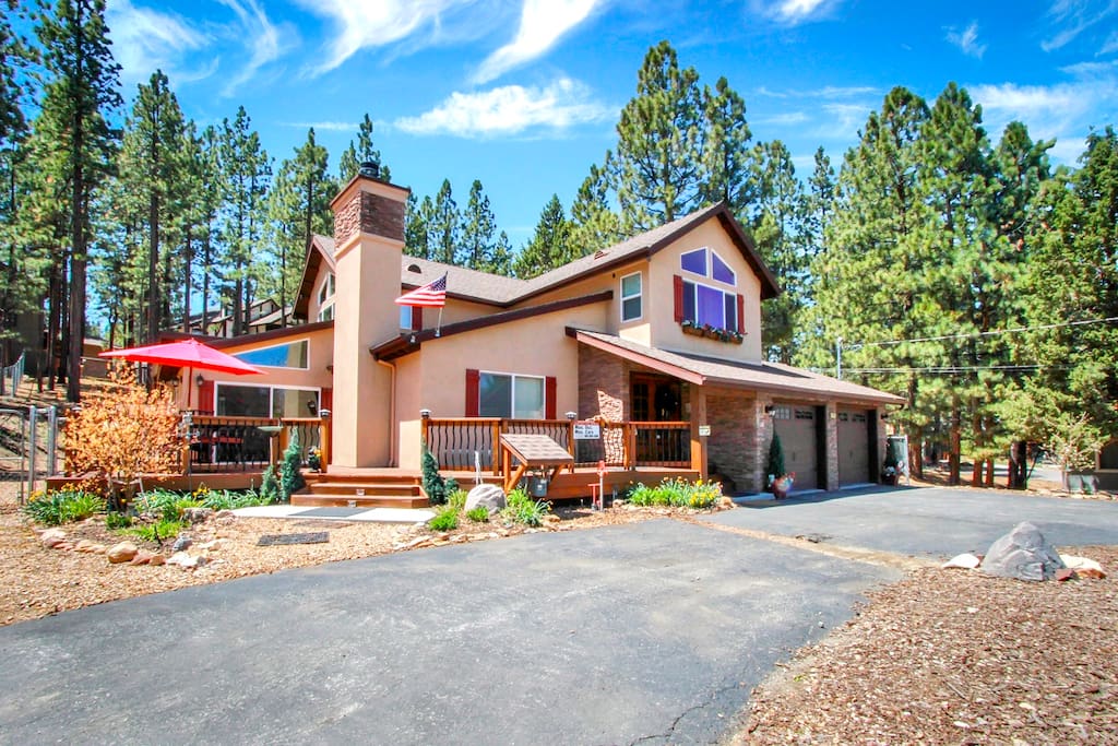 There is a wrap-a-round deck with a propane BBQ, patio table for 8 guests, kids picnic table.