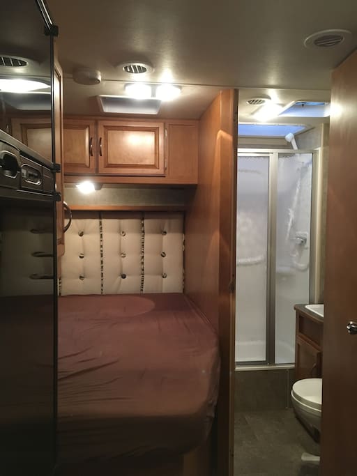 Double bed beside full washroom.