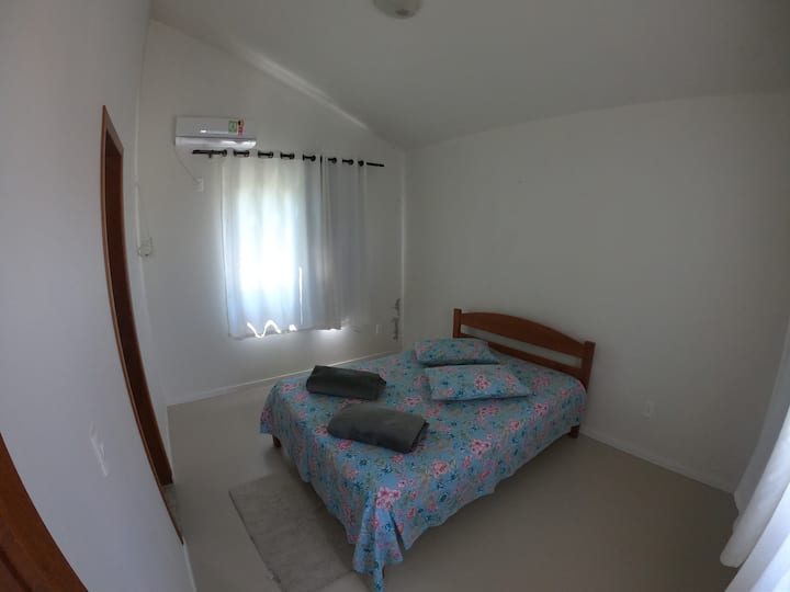 Suite con aire acondicionado en la casa.