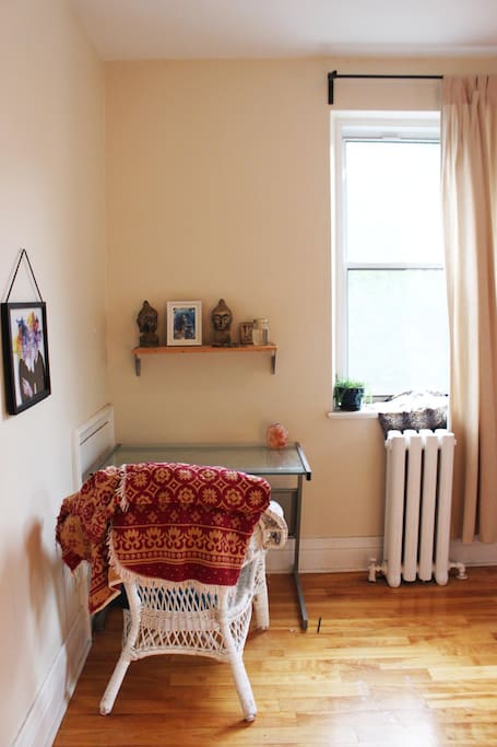 Queen-sized bedroom with two bright windows overlooking Mount-Royal.
