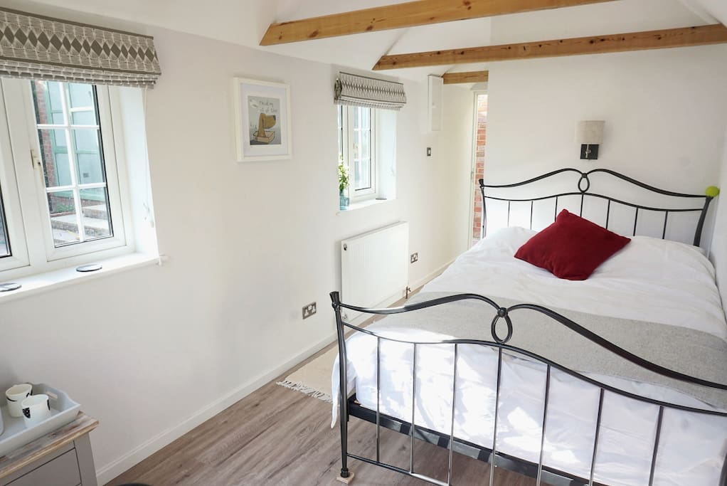 Clean and contemporary decor with lofted, pine-beamed ceiling – all recently done.