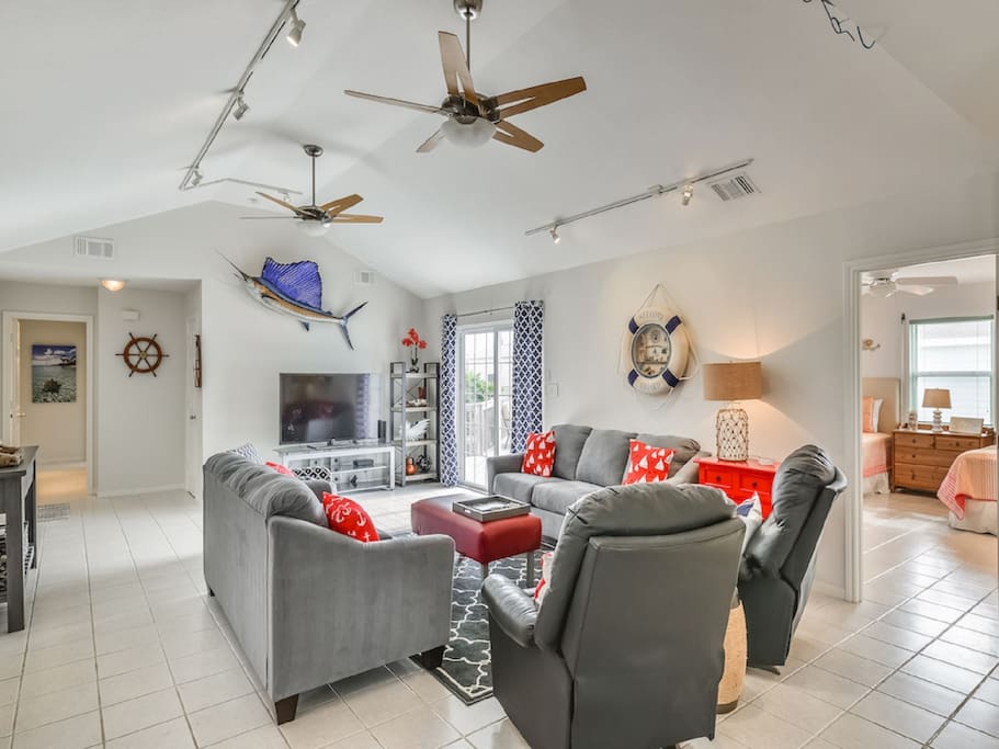 Large Open Living Area with Balcony Access