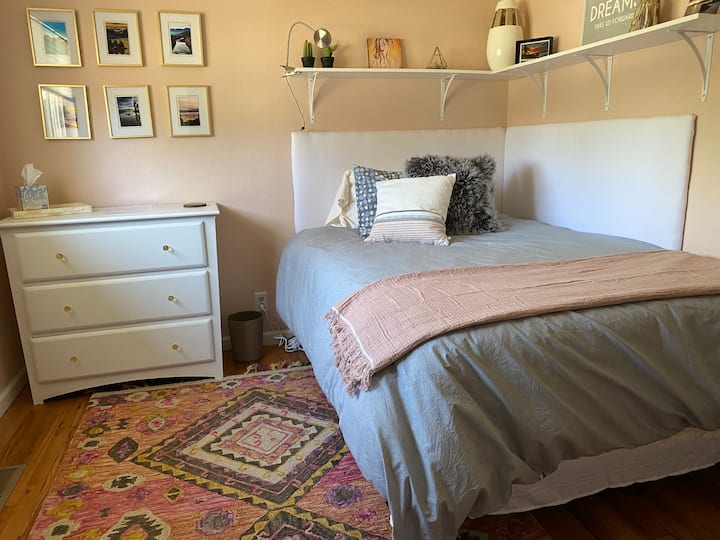 Your home away from home! Clean & Comfortable full-sized bed in cozy room for a nice restful sleep. Shared bath. 