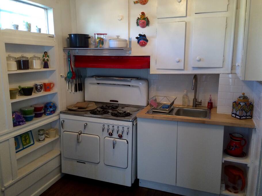 Kitchen, close-up view of Chambers stove and sink.