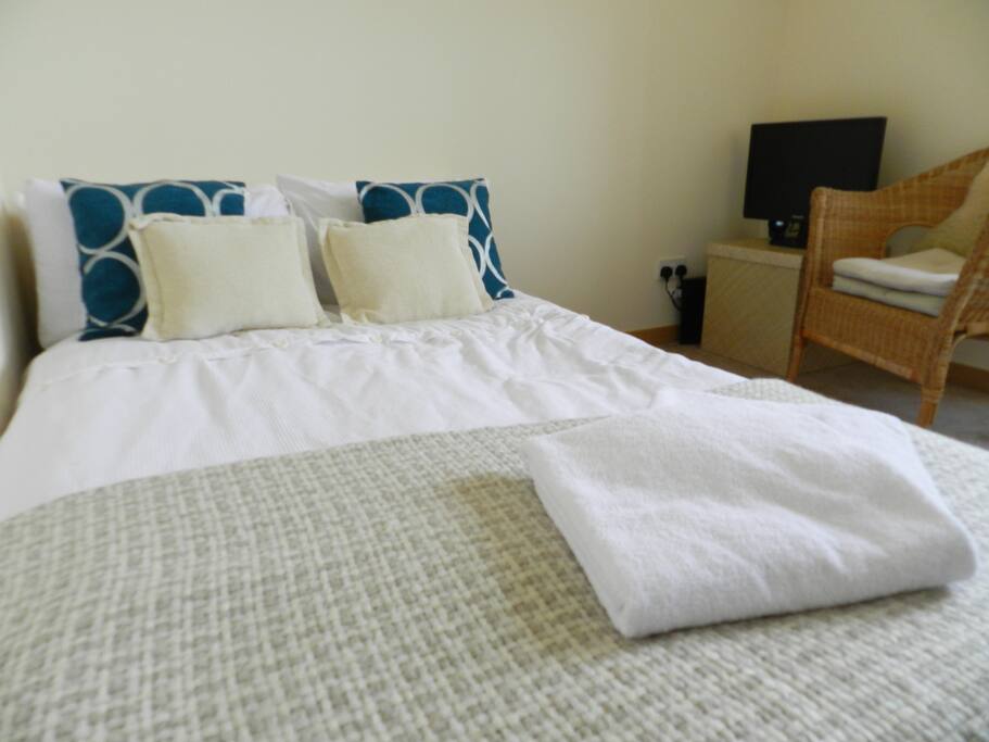 Lounge/Second Bedroom: Futon double bed, that can also be used as couch, dressing table, Playstation 3 with Netflix/Games.