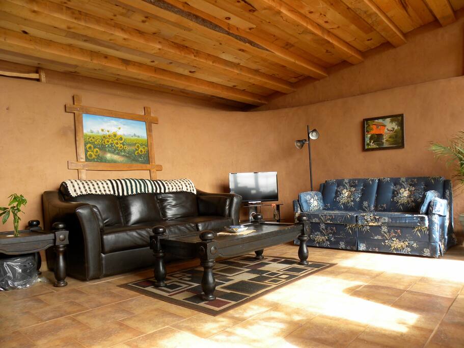 This cozy and warm living room is great for hosting family and friends through the day and cuddling up and winding down in the evenings.