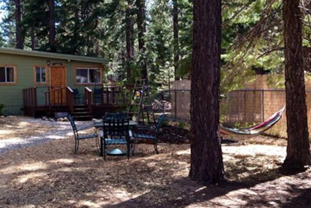 Front deck view, patio furniture & hammock.