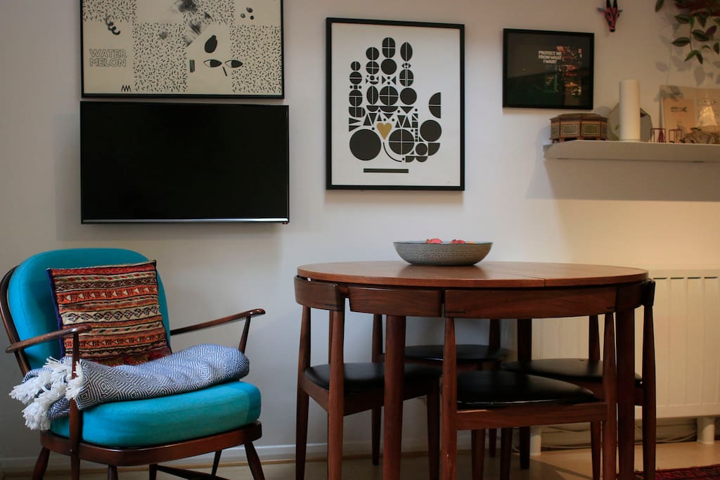 TV, dining table and living room