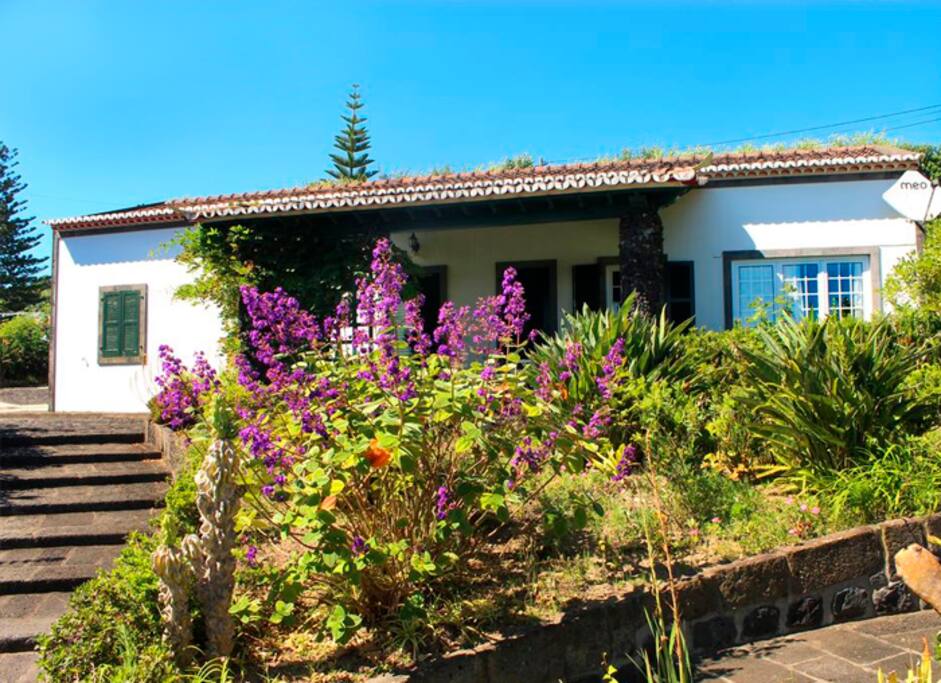 The house with natural stone in the balcony.