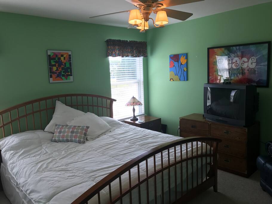 King bed. Guestroom with slight view of golf course.