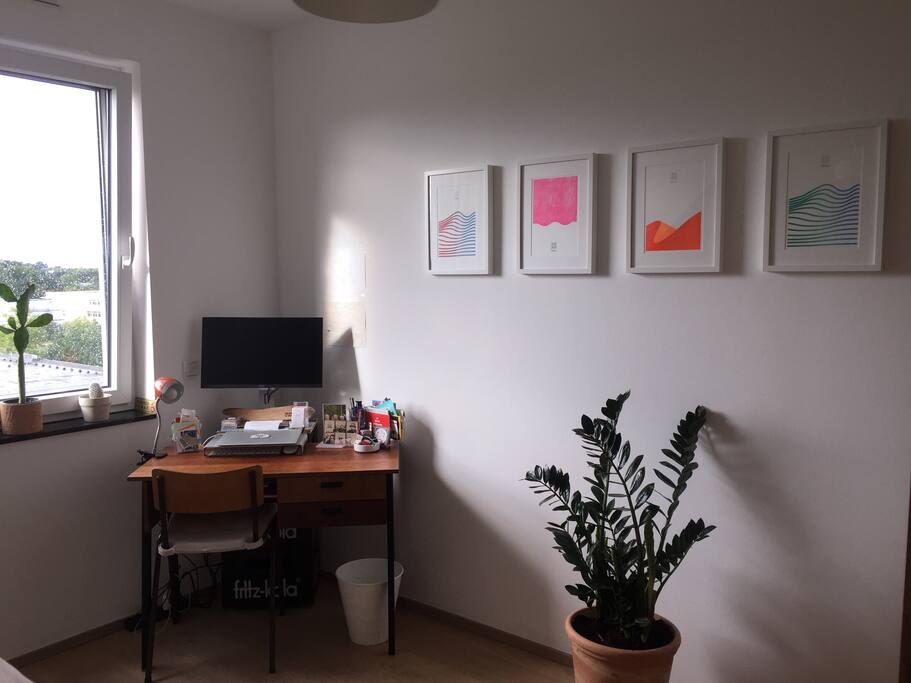 Room with desk and monitor