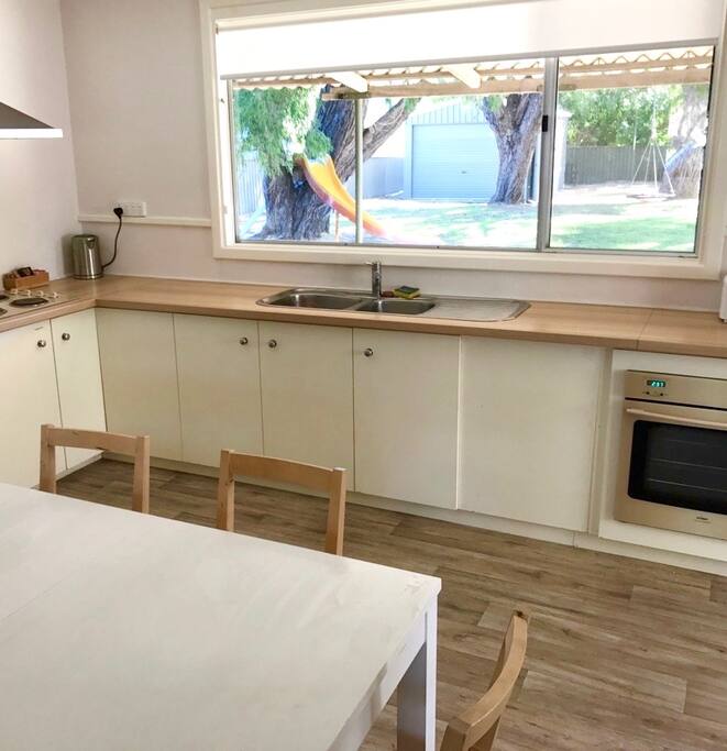 Fully equipped kitchen with complimentary tea, coffee, sugar.