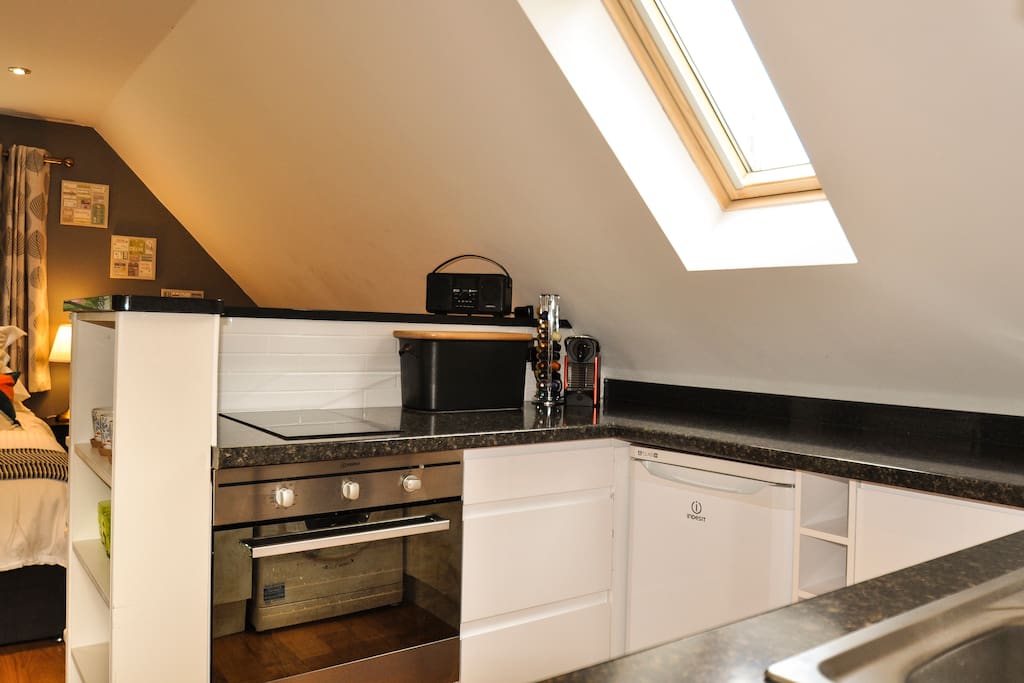 Kitchen with Nespresso machine and complimentary pods