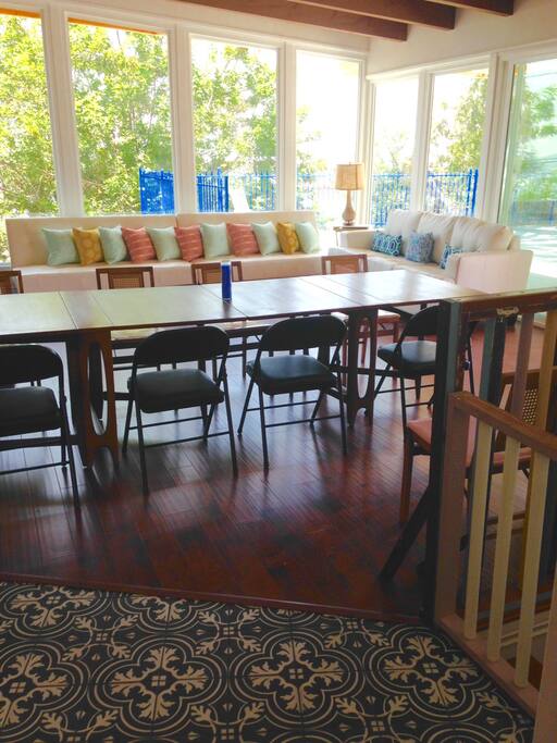 Dining room table accommodates 8 or more