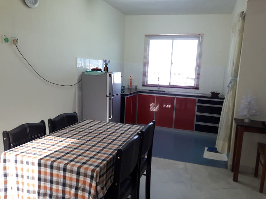 Pantry with fridge and kitchen cabinet