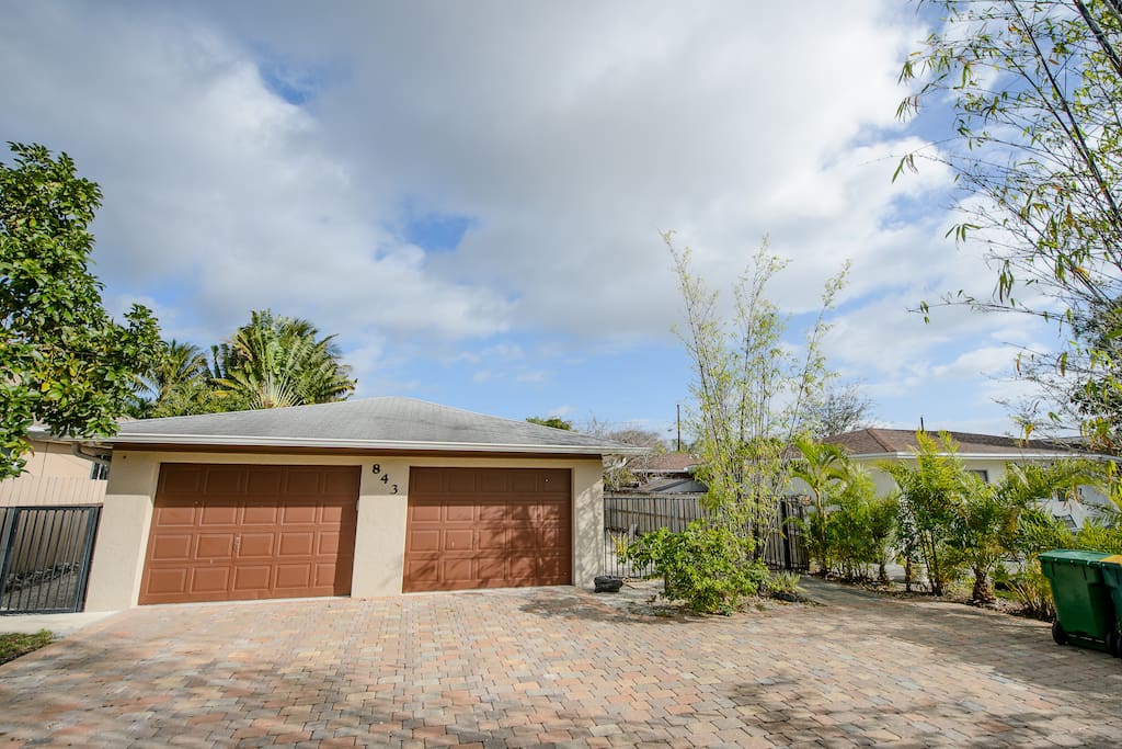 Front of house with parking area.
