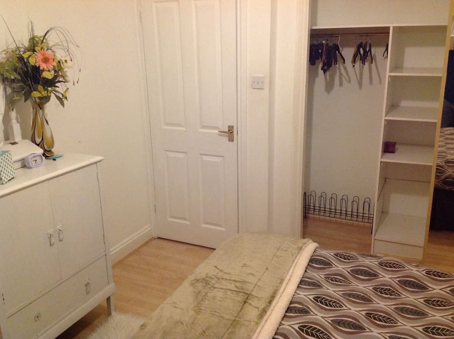 Wardrobe space and floor to ceiling mirror
