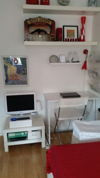Desk with work light. TV & DVD player.