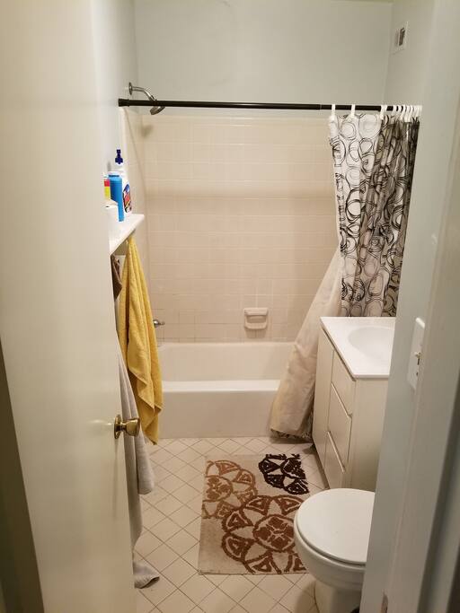 Full bathroom with tub.