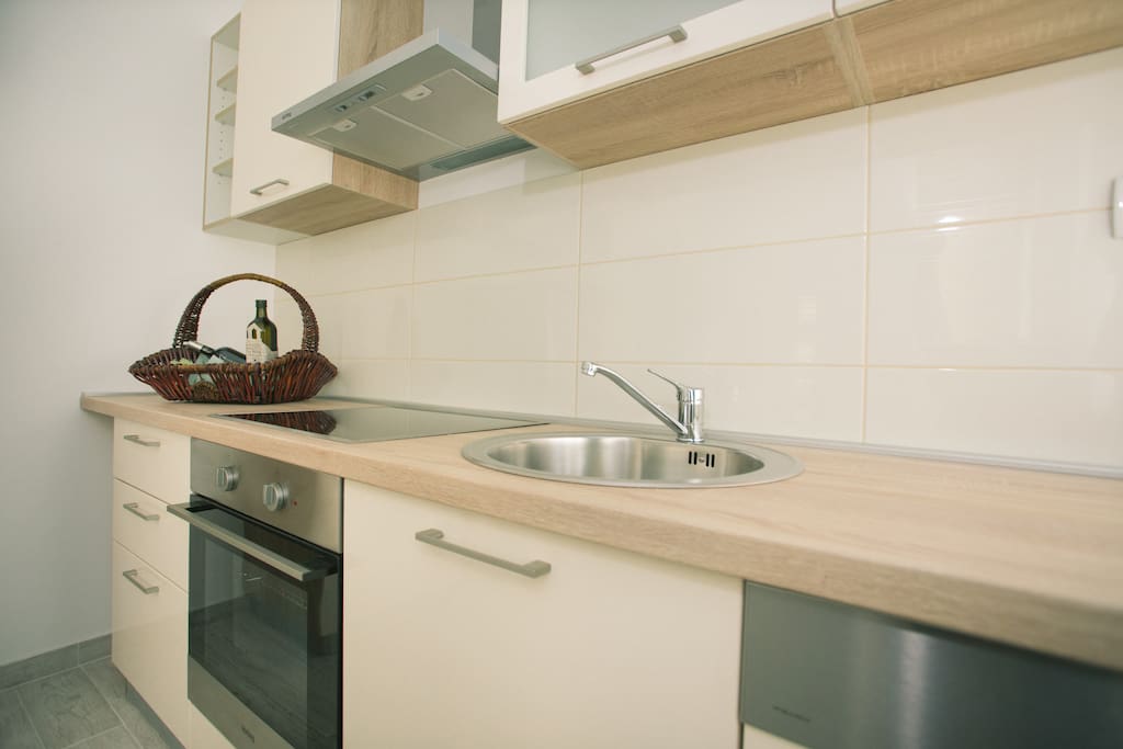 kitchen with baker, Cook, fridge, and dish washer